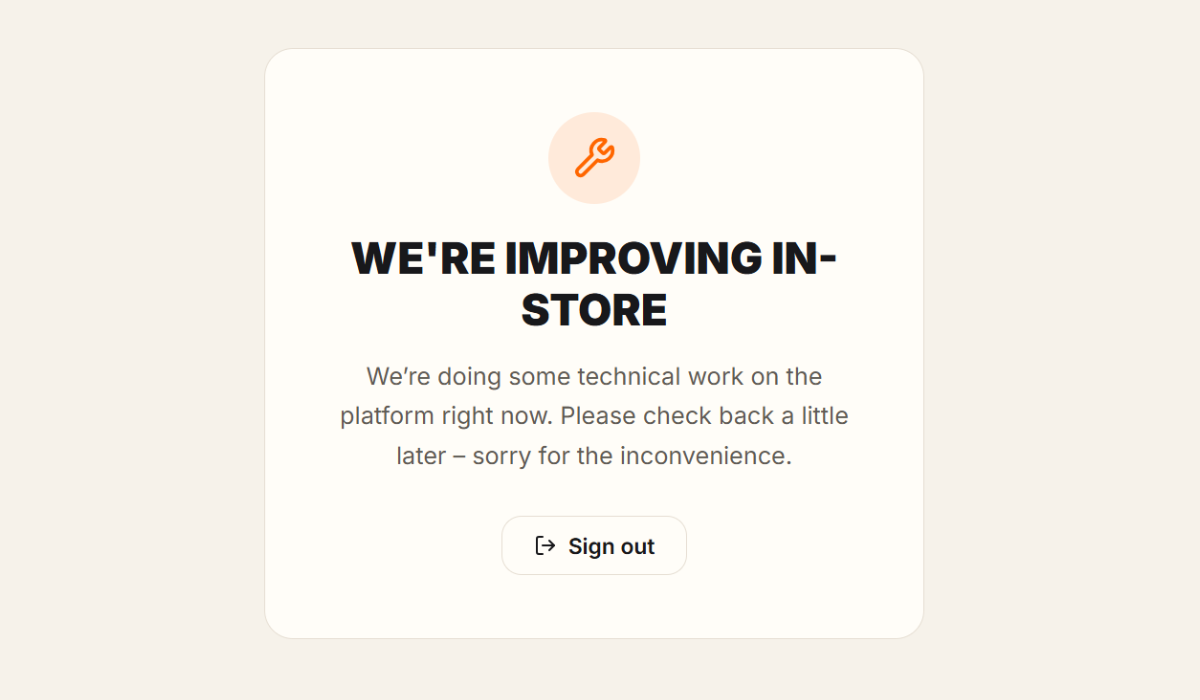 Maintenance screen with a wrench icon, the title We're improving IN-STORE, a short message and a Sign out button